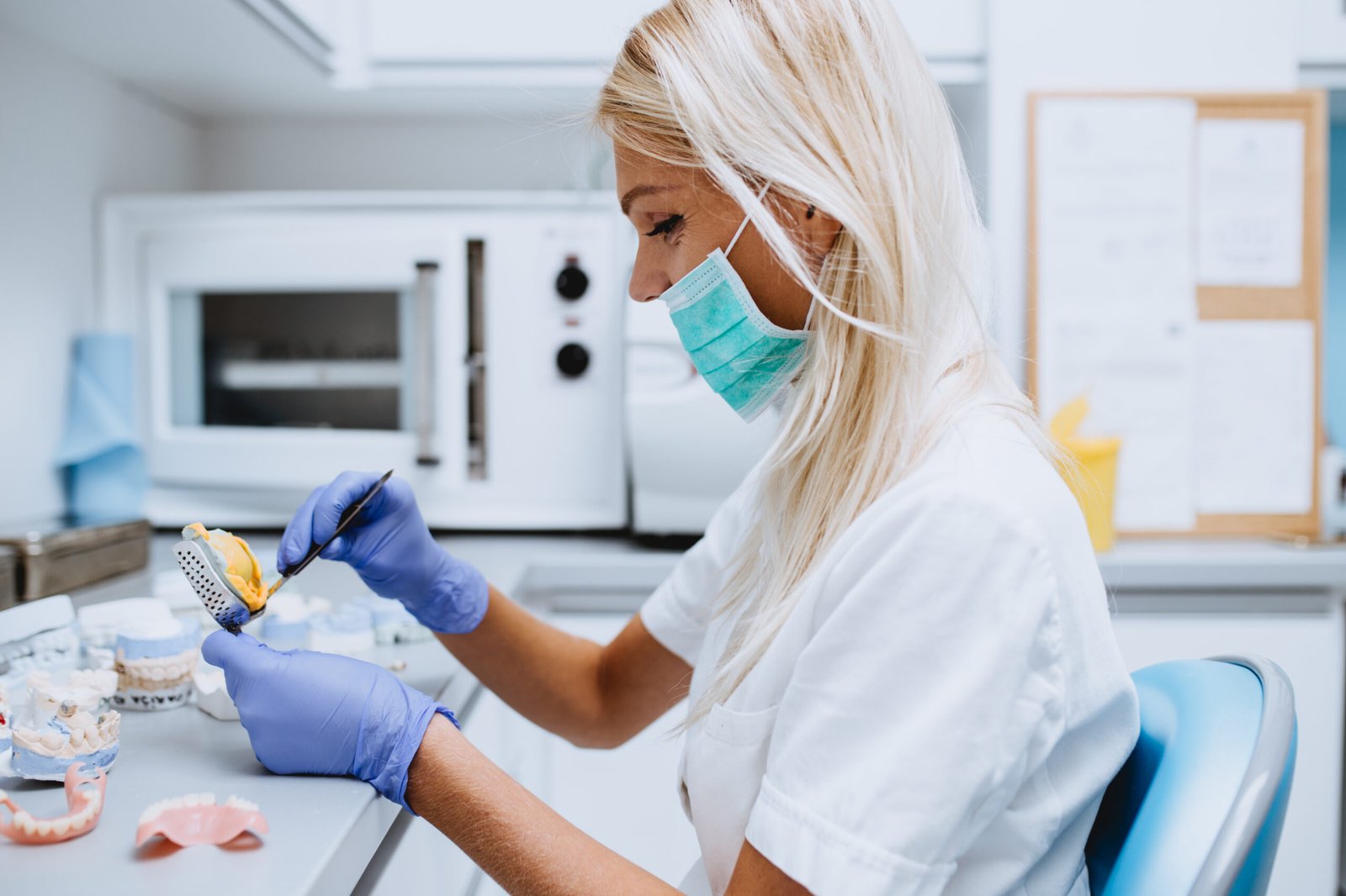 Dental Technician making Dentures