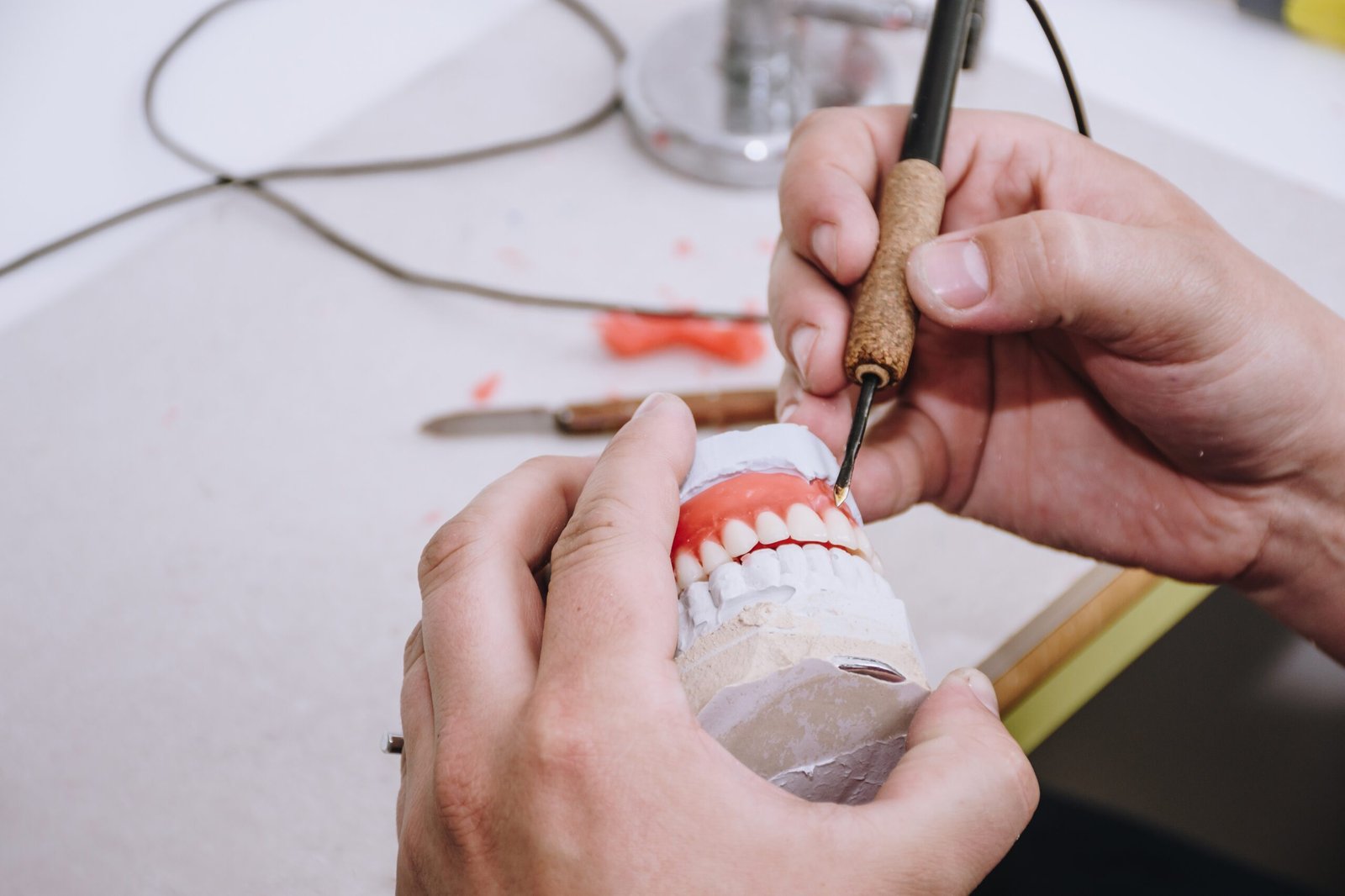 Denture-Design-Preston-3 Someone Making Dentures