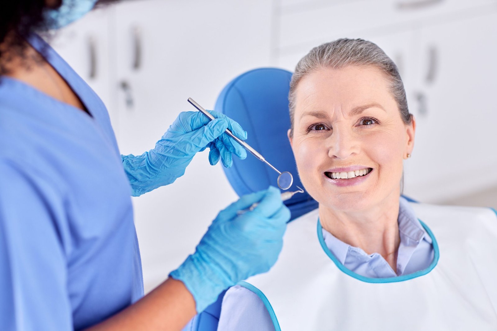 Woman Smiling with Denturist
